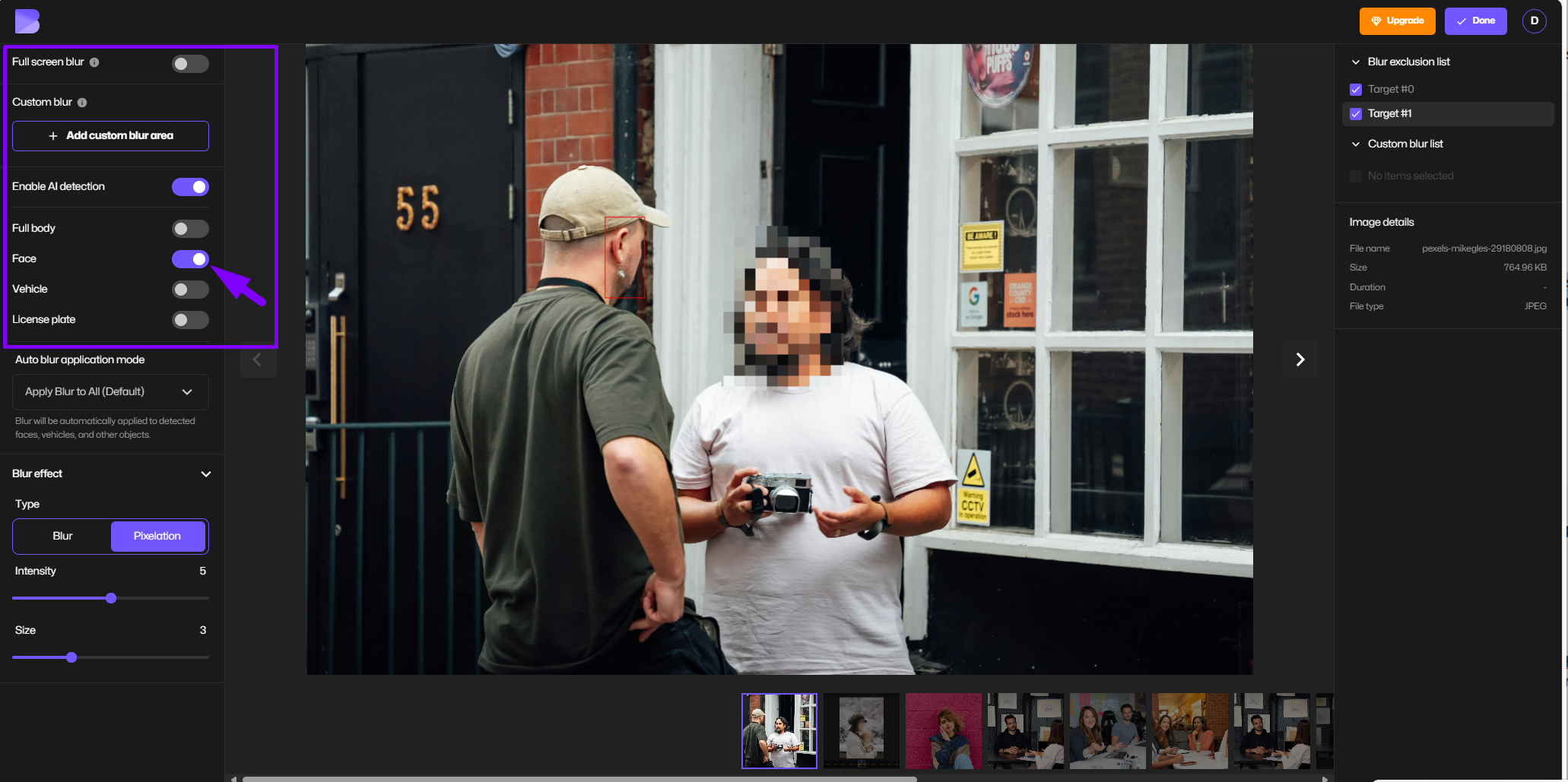 Pixelated face in image.