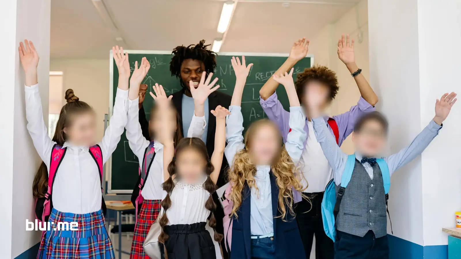 Classroom of students with faces blurred for privacy using BlurMe AI.